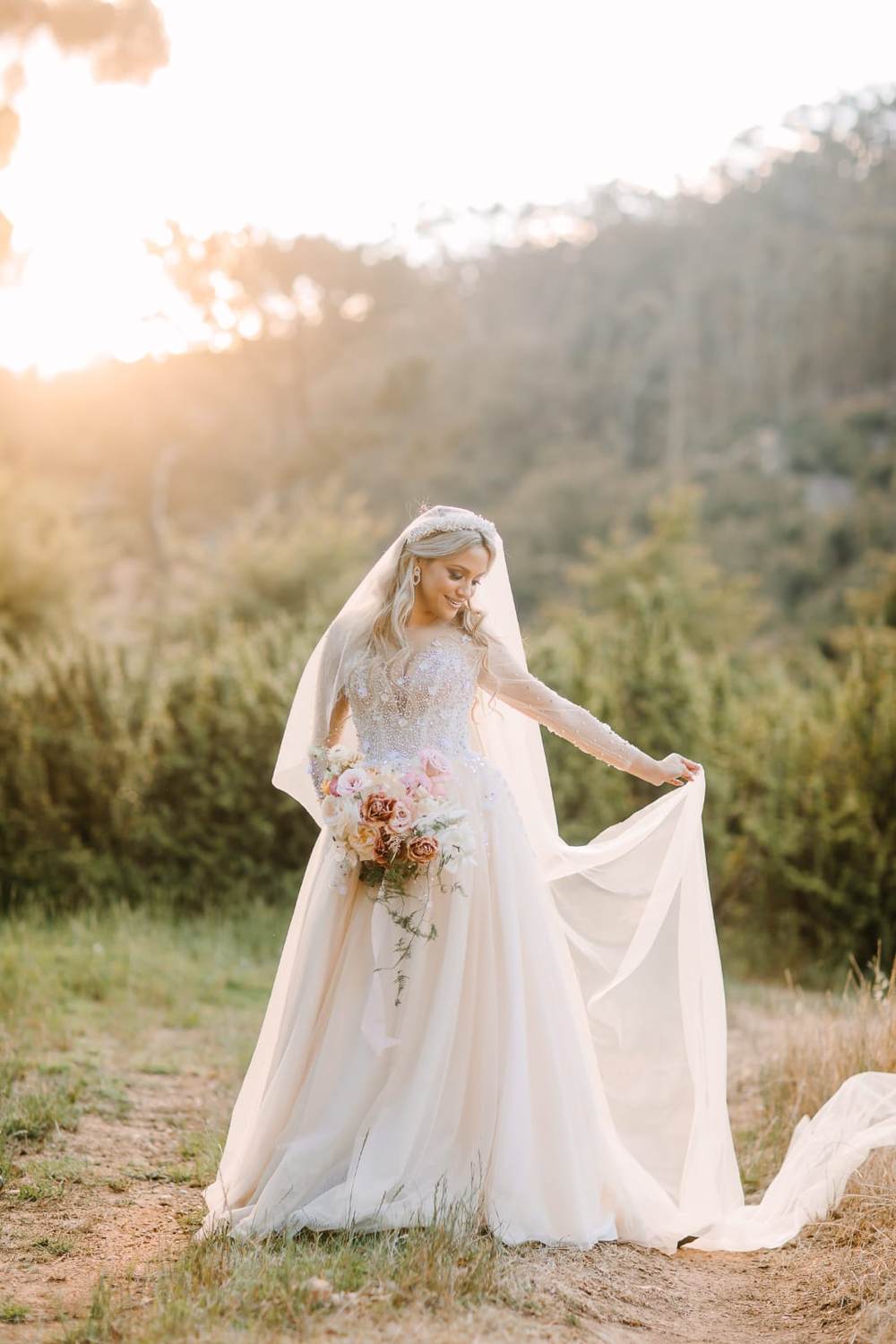 Bride at golden hour in a soft lace Saarahjasmin Couture wedding gown