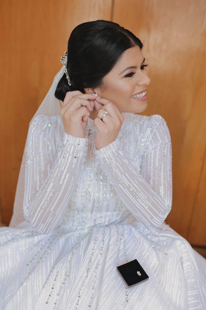 Bride in a shimmering hand-beaded Saarahjasmin Couture gown